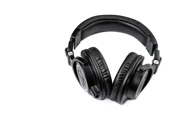 Black Studio Headphones above white background