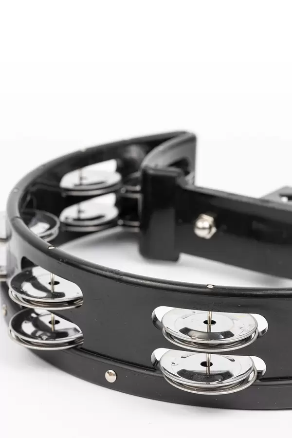 Black wood Tambourine above white background with copy space