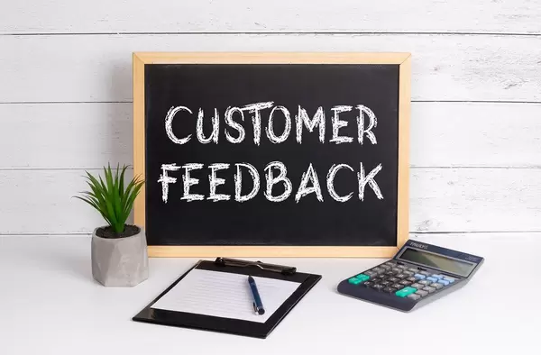 Blackboard with Customer Feedback text
