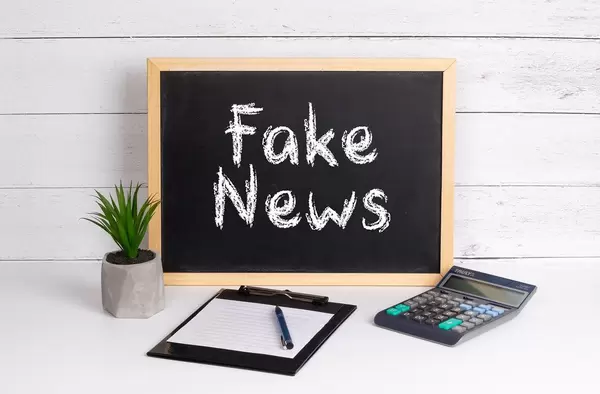 Blackboard with Fake News text