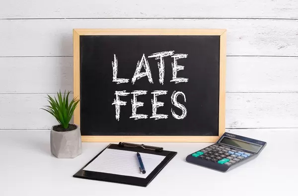 Blackboard with Late Fees text