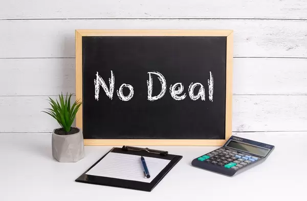 Blackboard with No Deal text