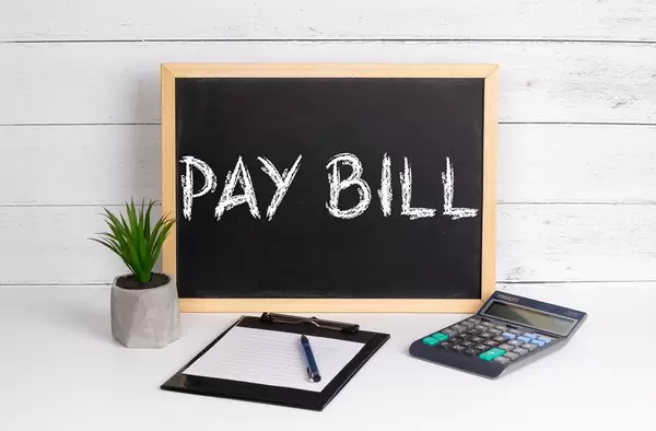 Blackboard with Pay Bill text