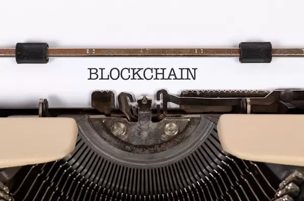 Blockchain printed on an old typewriter