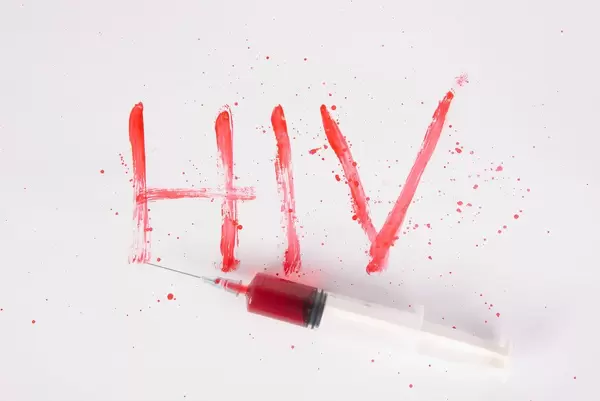 Bloody word HIV with injection needle