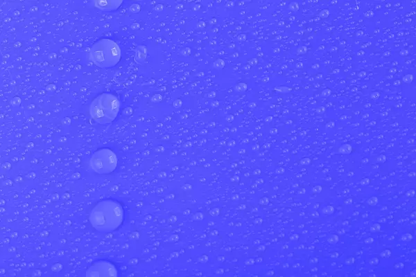Blue background with water drops