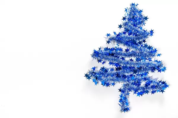 Blue christmas tree on white background with free space (Flip 2019)