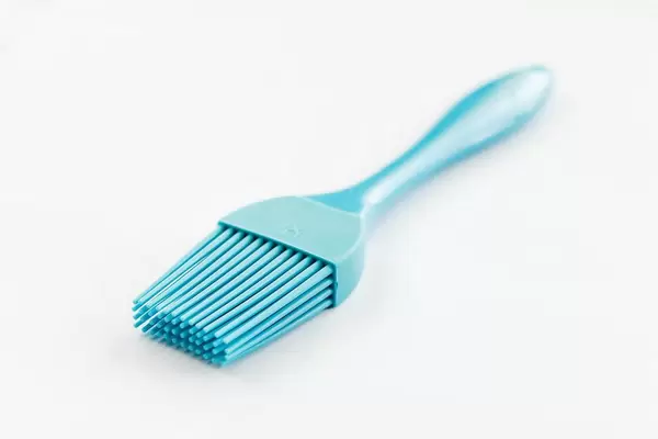Blue cooking brushing tool, close up
