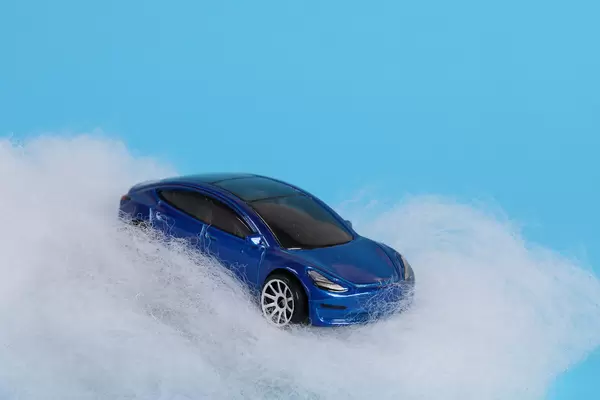 Blue electric car on cloud