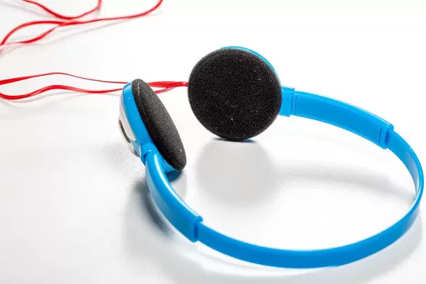 Blue headphones on white background