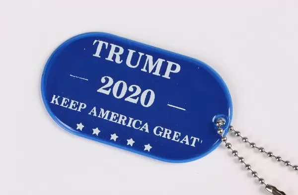 Blue military tag with Trump 2020 text on white background