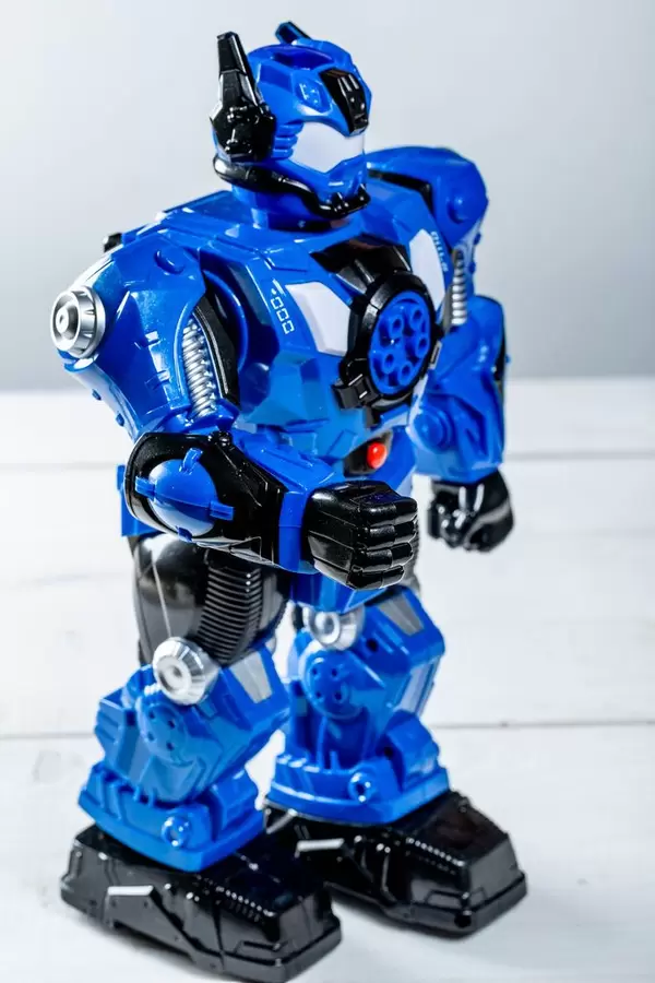 Blue robot toy on white background