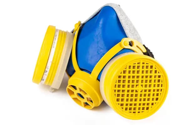 Blue-yellow respirator mask on white