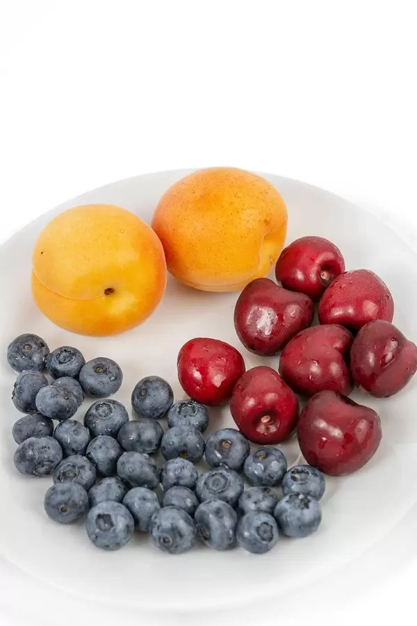 Blueberries Apricots and Cherries on the plate (Flip 2019)