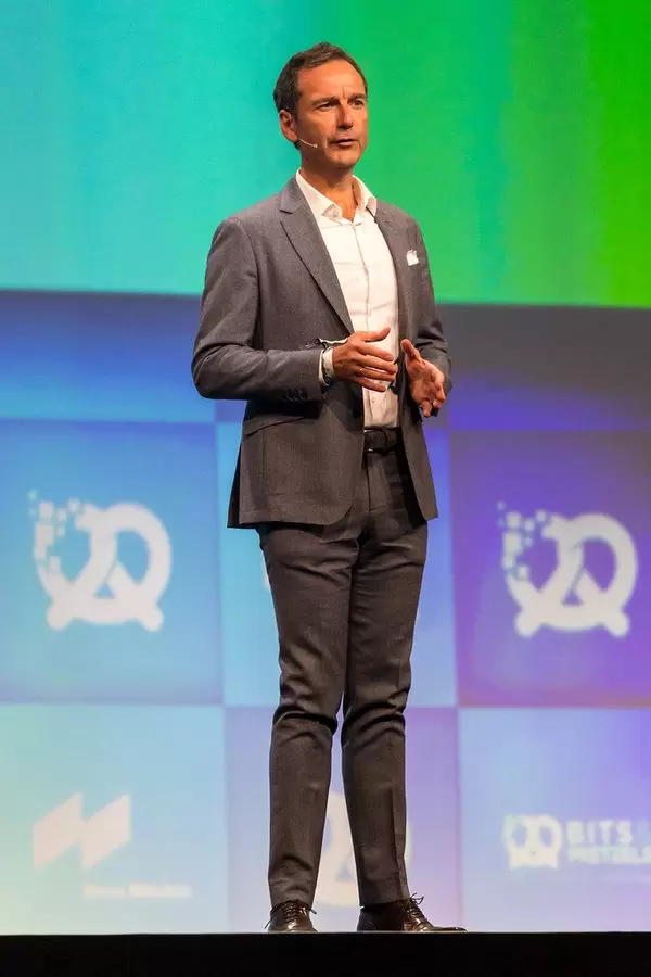 BMW Foundation Responsible Leaders Network Board Member Frank Niederländer speaks on the stage at the founders' conference Bits & Pretzels