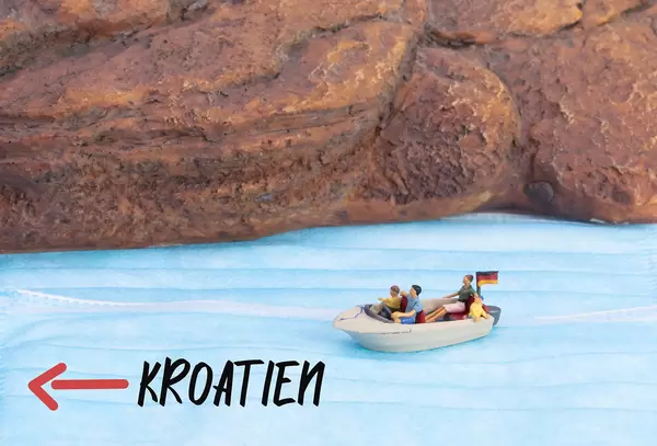 Boat with German flag on the way to Croatia