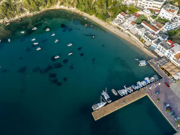 Boats anchored in the bay of Patitiri near the harbour on the Greek island of Alonnisos. Aerial view