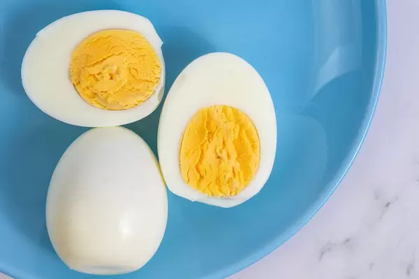 Boiled Chicken Eggs on the blue plate