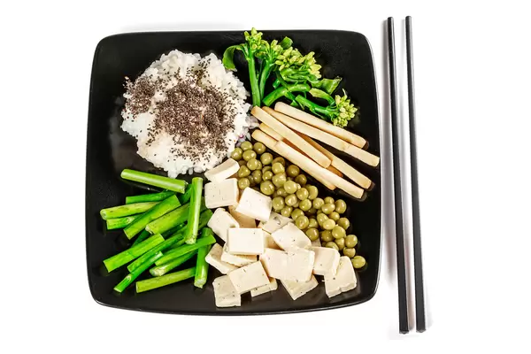 Boiled rice with vegetables and cheese