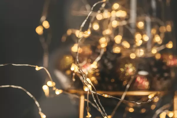 Bokeh background of golden glowing garland