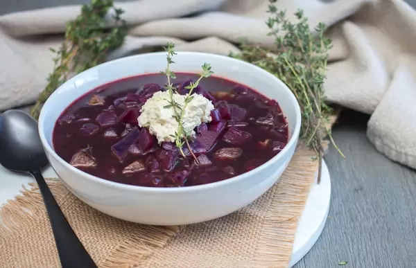 Borscht Soup In a White Bowl Top View With Thyme  Flip 2019