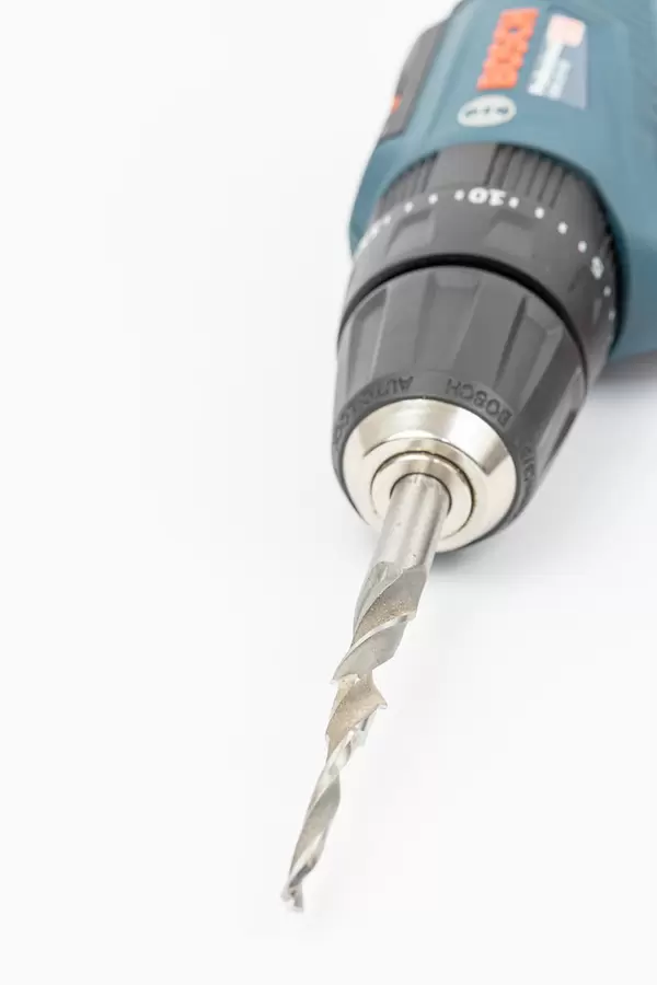 Bosch Cordless Drill with Drill for Wood above white background