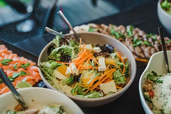 Bowl Of Camambert Cheese and Tangerine Salad With Greens (Flip 2019)