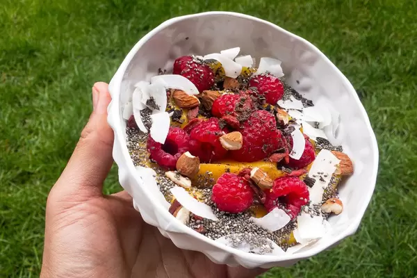 Bowl with Mango, Coconut, Almonds and Rasperry