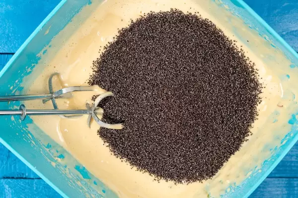 Bowl with Poppy Seeds and Cream for cake