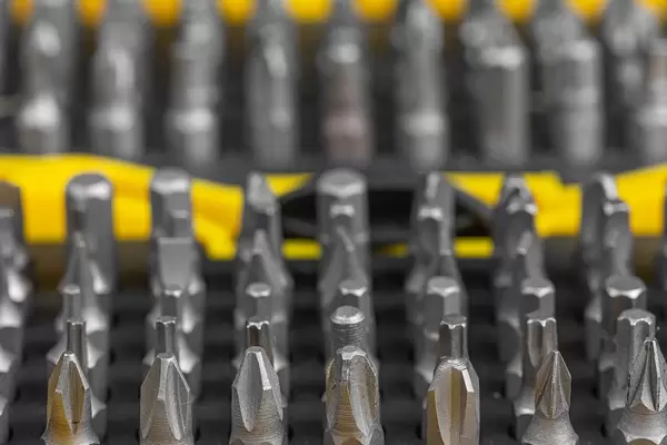 Box with a set of bits for a screwdriver