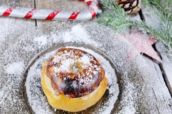 Bratapfel, snow on baked apples for Christmas
