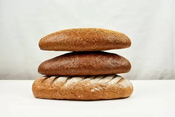 Bread's Pile. Different kinds of bread on white