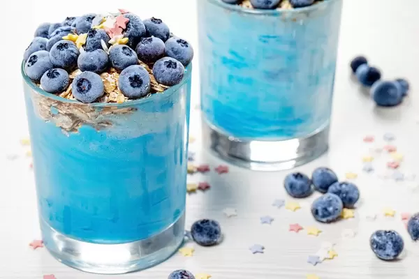 Breakfast concept with fruit smoothie and fresh blueberries (Flip 2019)