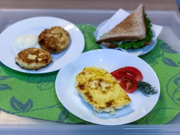 Breakfast: Sandwich, eggs and Russian pancakes