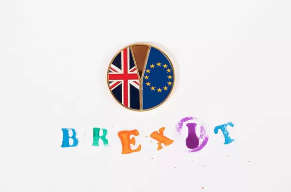 Brexit medal coin with colorful Brexit stamp text