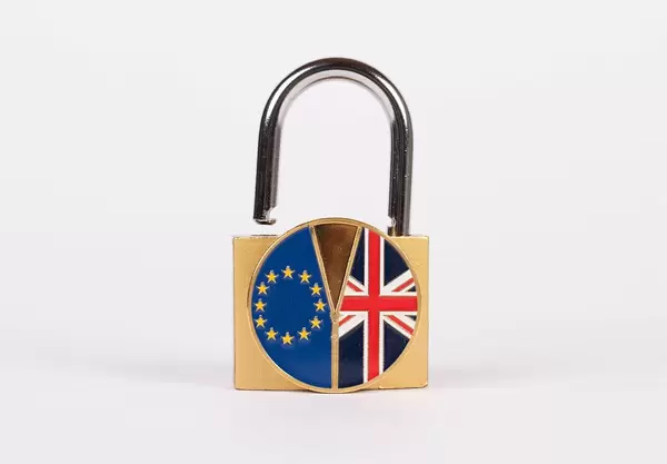 Brexit medal coin with padlock on white background (Flip 2019)