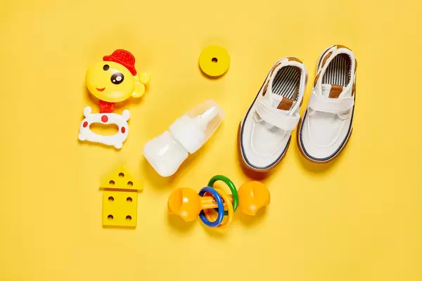 Bright baby boys set with toys, shoes and milk
