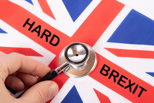 British flag with Hard Brexit text and stethoscope