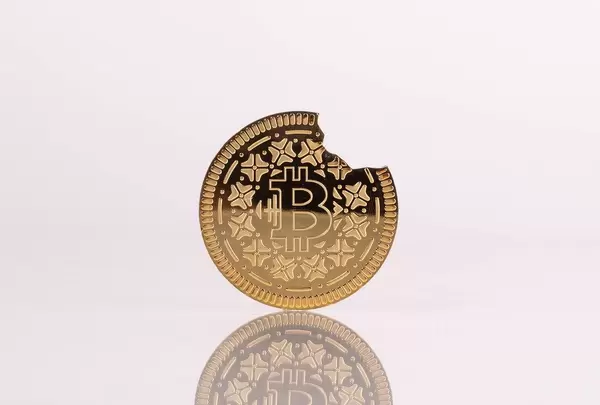 Broken Bitcoin on white background