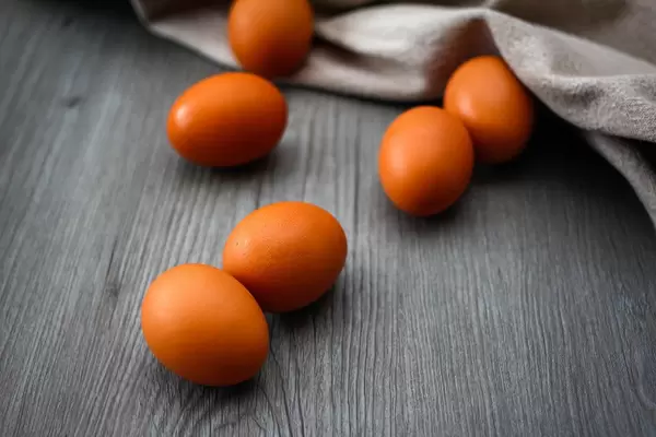 Brown Eggs Close-Up on a Wooden Background