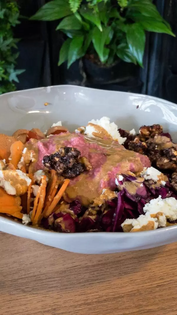 Brown rice, beetroot, carrots and sesame, pickled red cabbage, cherry tomato, roasted walnuts, ewe's cheese, beetroot and hummus, spicy tahini dressing
