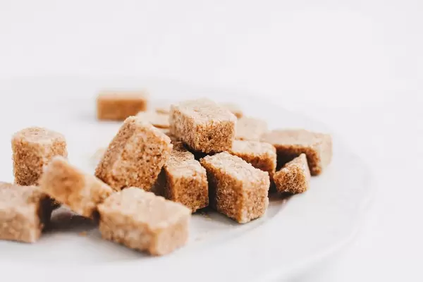 Brown sugar cubes , close up