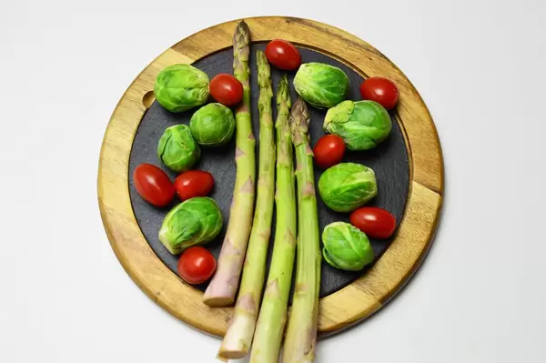 Brussels sprouts, cherry tomatoes and asparagus