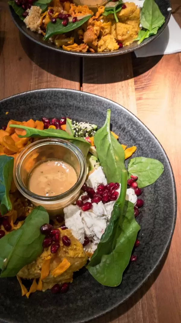 Buddha Bowl with lentils, sweet potatoes, avocado and pomegranate