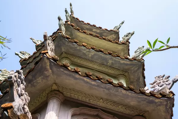Buddhist Pagoda Tower with several Ornaments on Top of Marble Mountains in Da Nang, Vietnam