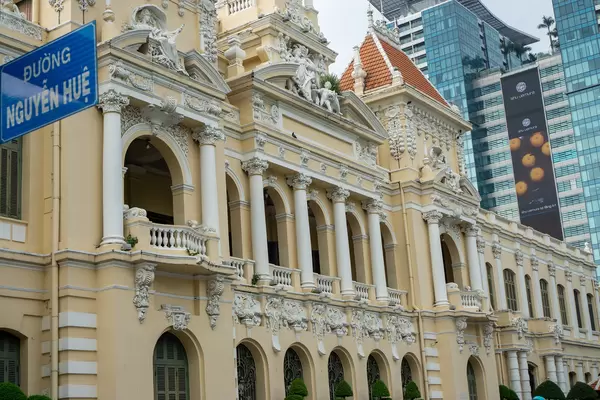 Building of People's Committee of Ho Chi Minh City at Nguyen Hue Walking Street with Vincom Center Shopping Mall in the Background