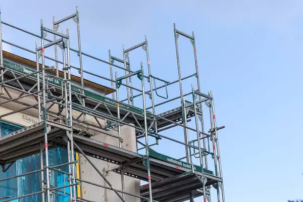 Building with scaffolding due to renovation works in Cologne, Germany