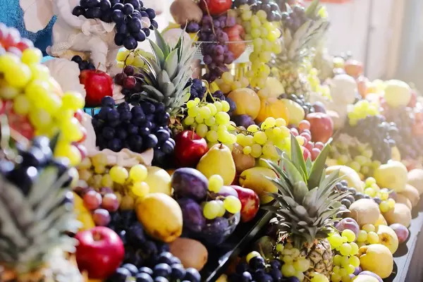 Bunch of fruits, grapes, pears, pineapples, apples, plums, oranges (Flip 2019)