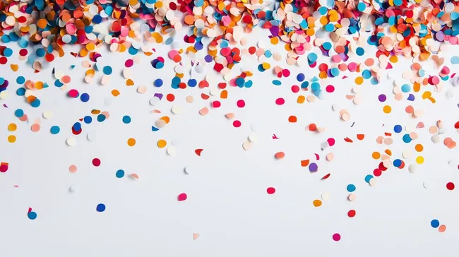 Bunte Konfetti-Explosion auf weißem Hintergrund