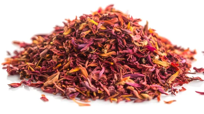 Bunte Teeblüten auf weißem Hintergrund